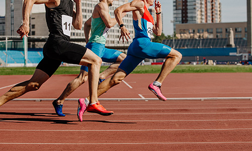 Competing runners on a track